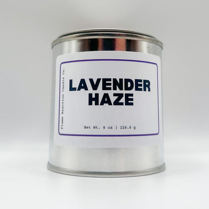 Candle tin labeled 'Lavender Haze' on a white background